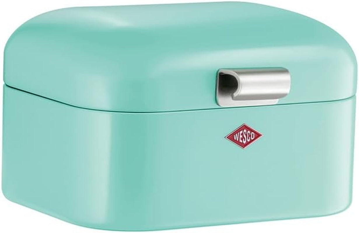 Wesco Mini Grandy brødbeholder i pink, pulverlakeret stålplade, ventilationshuller og robuste håndtag til opbevaring af madkasser Naty Shop Mint