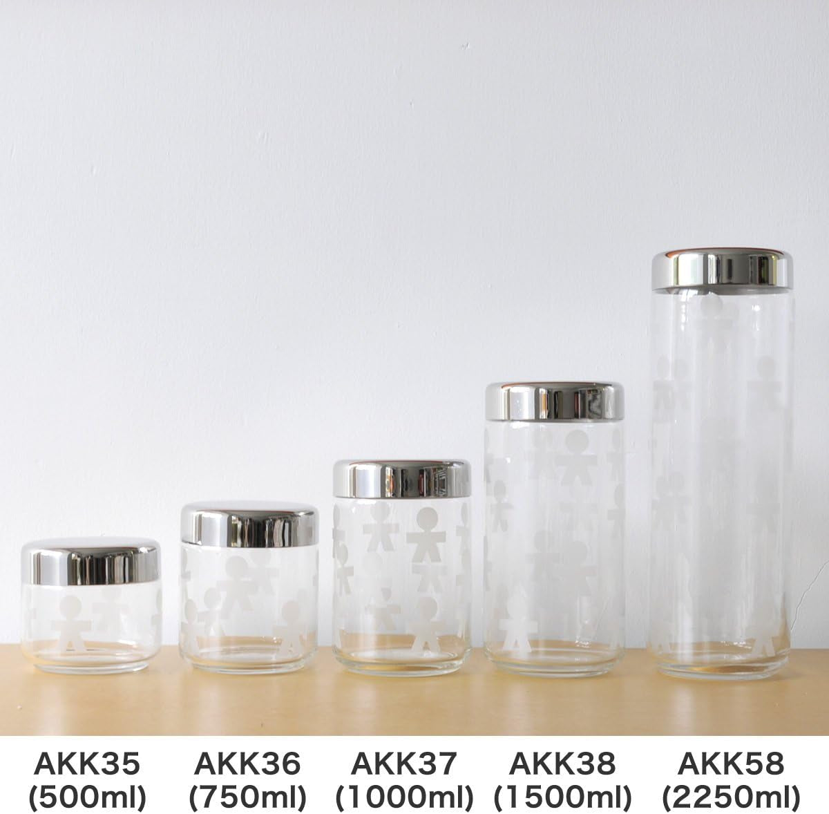 Alessi AKK37 GIROTONDO Køkkenkrukke i glas med påtryk og forseglet låg i rustfrit stål, L 21,6 cm, H 10,5 cm Fødevarekasser Naty Shop