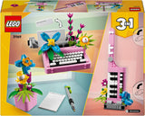 LEGO Creator 3In1 skrivemaskine med blomster - ombyggeligt legetøj til en Keytar-model eller til en urtepotte med notesbog og kuglepen - byggesæt - gave til piger og drenge fra 8 år 31169 Byggesæt Besuche den LEGO-Store