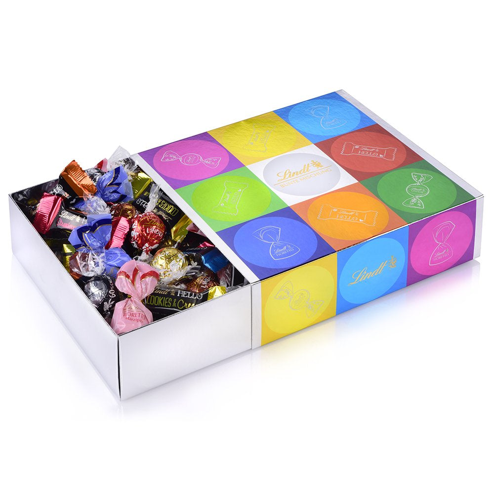 Chokoladesortiment (37 LINDOR-kugler, 24 Hello Mini-pinde, 10 Mini Fioretto), chokoladegave (1 x 815 g) og HELLO Mini Emoti, mælkechokolade i 5 humørikon-designs, 164 g