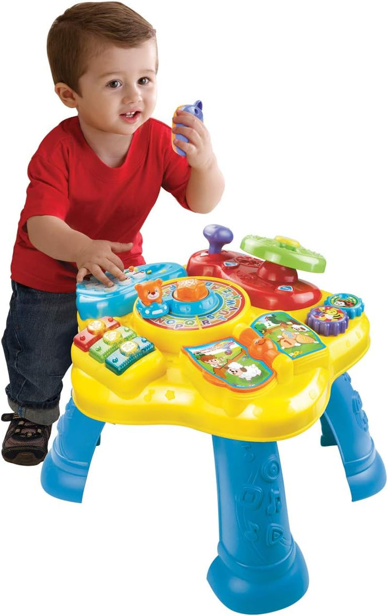 VTech Baby Adventure Legebord - Farverigt legebord til babyer med 6 spillebaner og interaktive elementer & Baby My First Song Book 6-siders farverig bog og bevægelige elementer til leg Bebe Toys Naty Shop