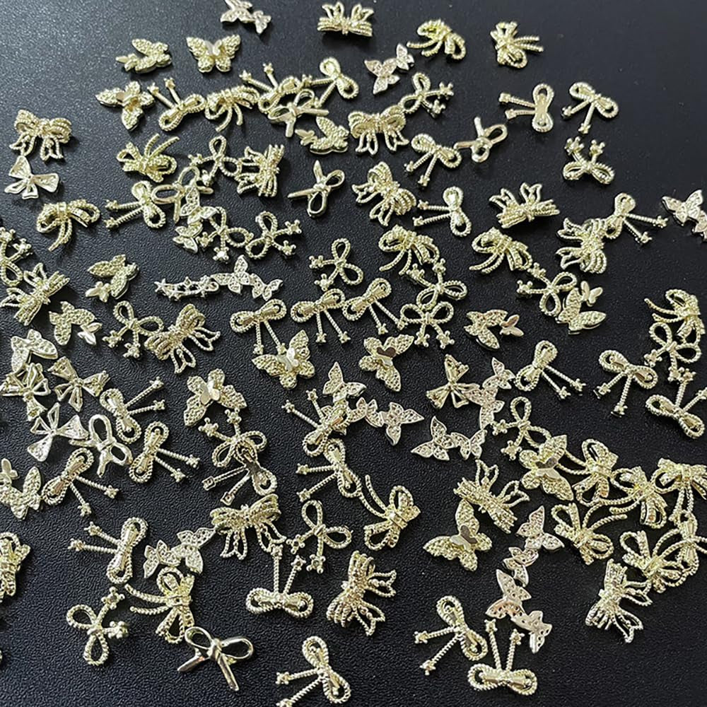 50Stück 3D Guld Sløjfe Nail Charms Butterfly Nail Art Charms Legierung Bogen Nagel Charms Nägel Zubehör Schleife Nagelschmuck Metall Schleifen Schmetterling Nageldesign Nagelanhänger Nailart Strasssteine