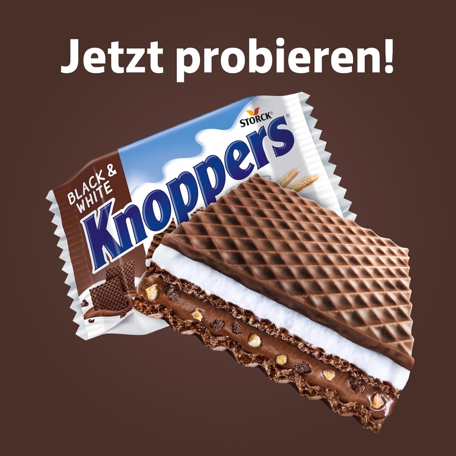 Hvide og sorte Knoppers – 8 x 25 g – Vaffelskiver fyldt med mørke kakaoblater, stykker af sorte kiks, mælk og nougatcreme