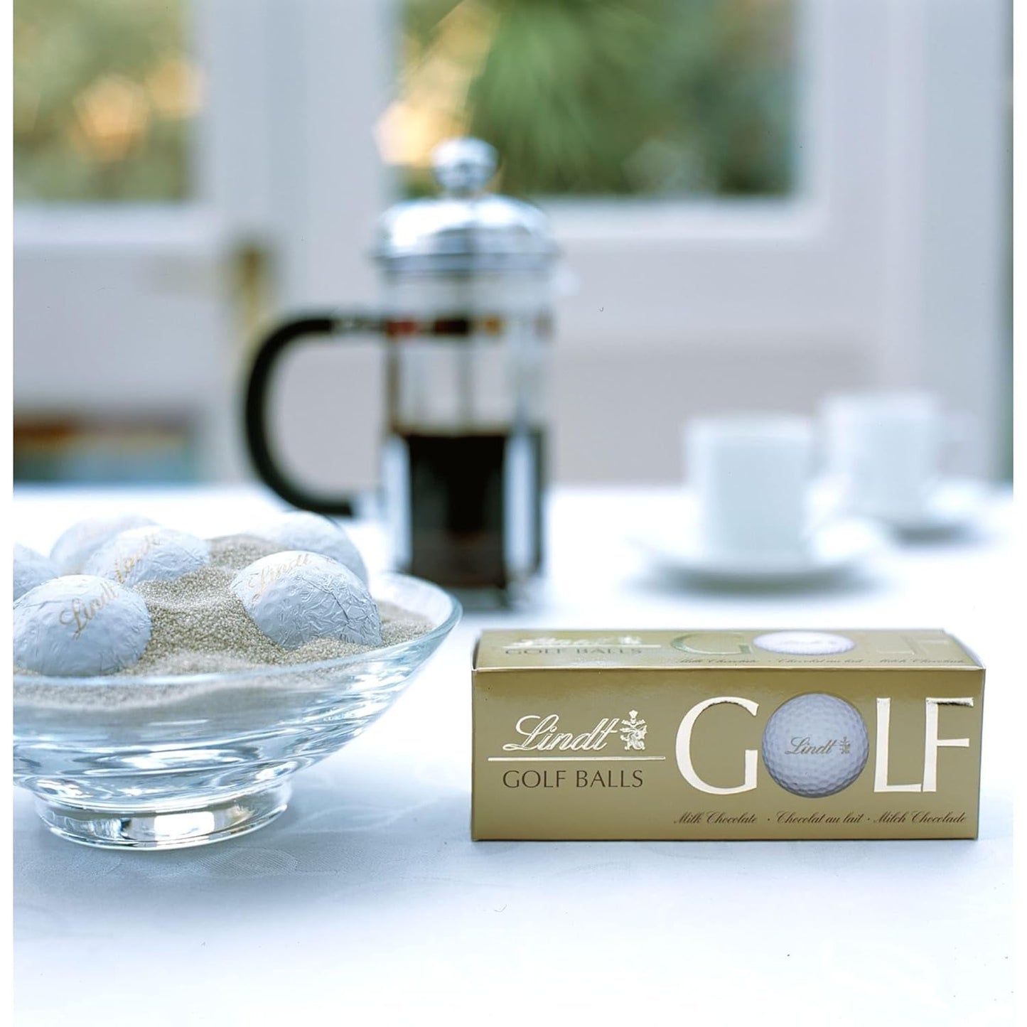 Lindt Schokolade - Golfbolde | 110 G| Drei Golfbälle Aus Lindt Vollmilch-Schokolade Mit Nougatcremefüllung Und Waffelstückchen | Pralinengeschenk | Gave til golfspiller | Schokoladengeschenk Naty Shop