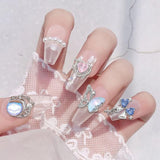16 Stile Luxus Mond Stern Nagel Charms 3D Nail Charms Y2K Legierung Strasssteine ​​​​Bogen Schmetterling Nagel Schmuck Metall Nail Art Charms Nägel Glitzersteine ​​Nailart Rhinestones Nageldesign Zubehör