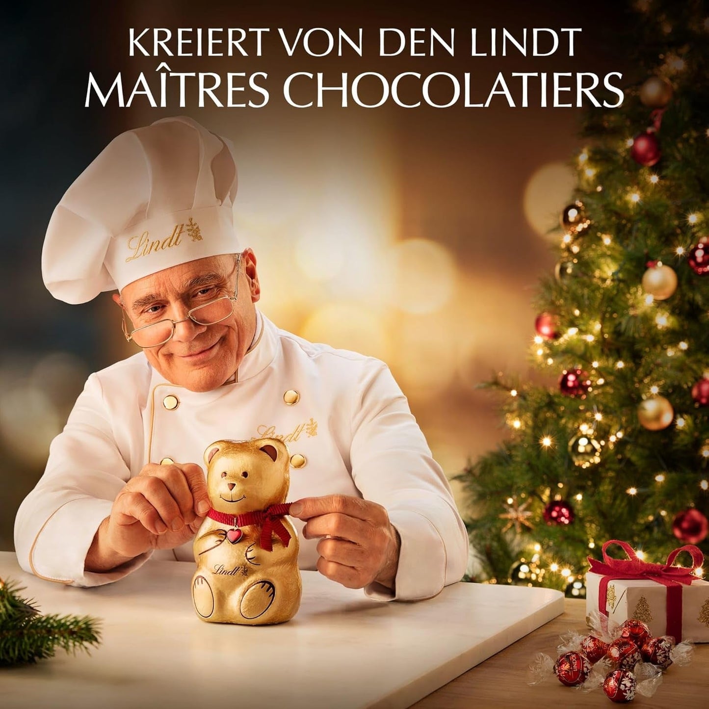 Lindt Chokolade | Æske med guldstykker praliner | 180g | 18 praliner i 10 sortimenter som fint sortiment af praliner, nogle med alkohol | Premium gaveæske med julepraliner