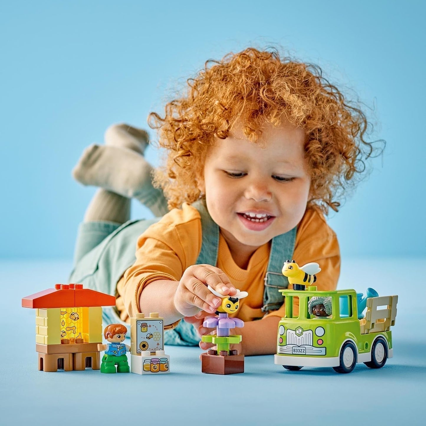 LEGO DUPLO Bybiavl og bistader, pædagogisk legetøj til småbørn med 2 figurer og en mobil lastbil, bygge- og ombygningssæt, legetøj til småbørn fra 2 år 10419 Byggesæt Besuche den LEGO-Store