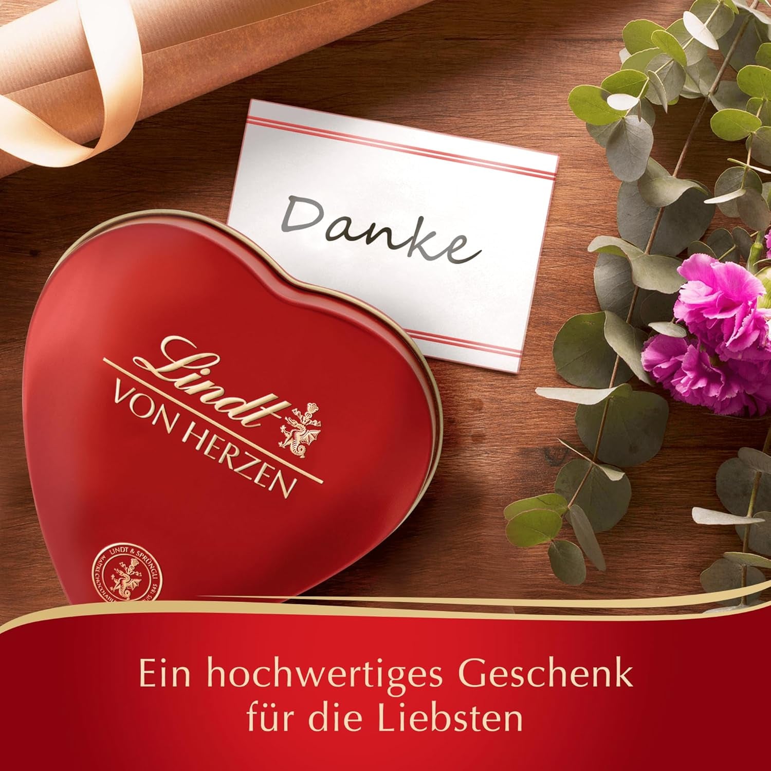 Lindt Chokolade fra hjertet | 30 g | 6 praliner i Marc de Champagne, Coeur à l'Orange, Crispy Milk Chocolate, Orange Marcipan i en smuk hjerteformet æske | Gave af chokolade | Chokolade gave