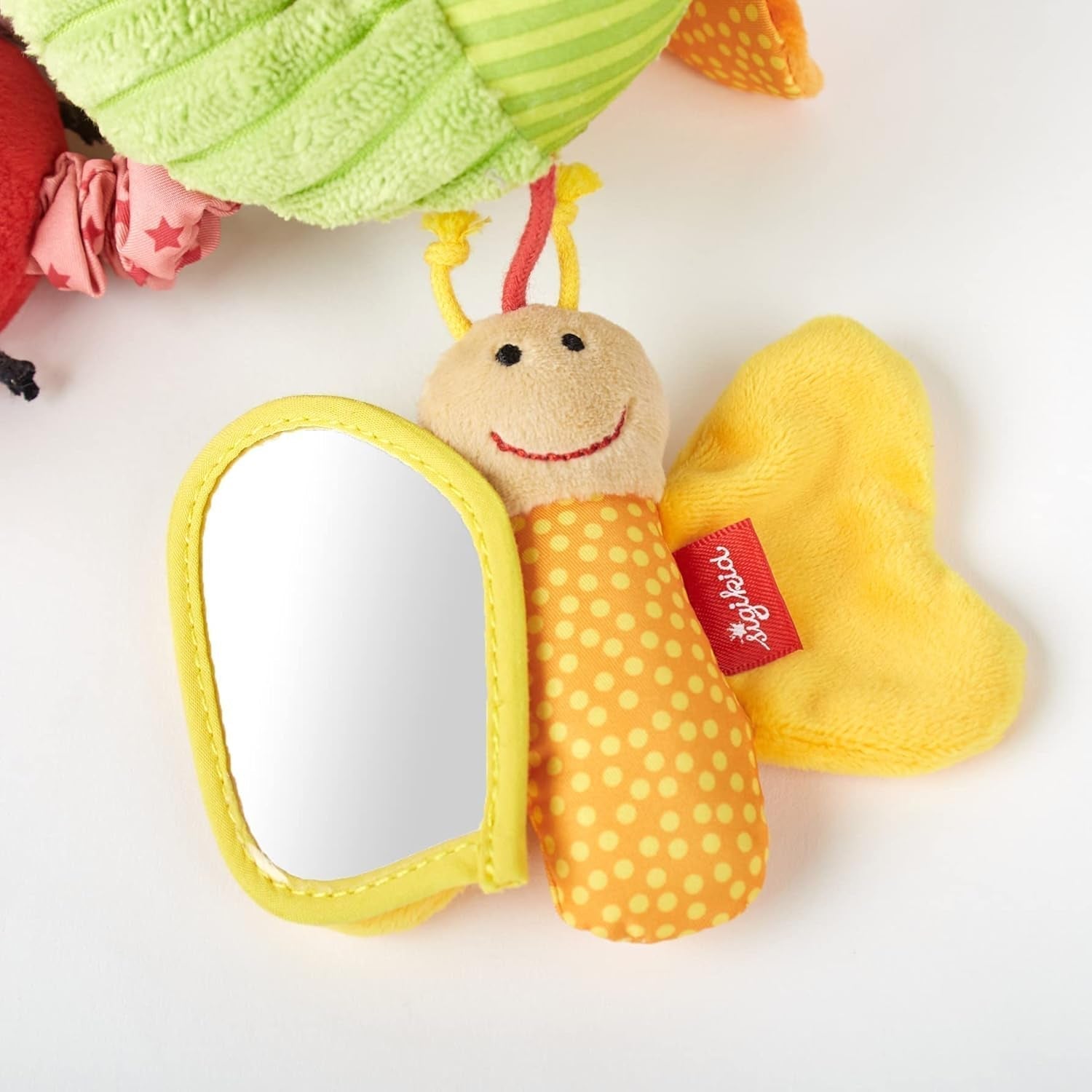 SIGIKID 42249 Aktiv spiralsommerfugl Baby Activity On Tour pigelegetøj til børn anbefales fra fødslen flerfarvet Legetøj Bebe Naty Shop