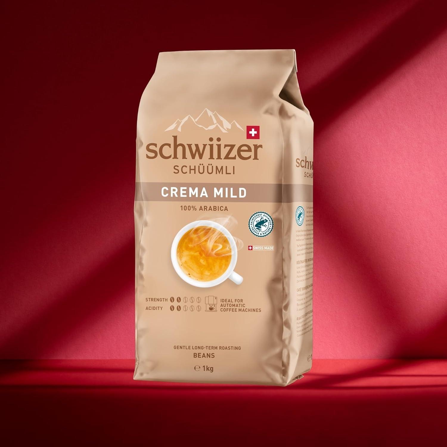 Schwiizer Schüümli Crema Mild, 100% Arabica kaffebønner fine, harmoniske og milde, ideel til automatiske espressomaskiner, styrke 2/5, let ristning, Rainforest Alliance, 1 kg