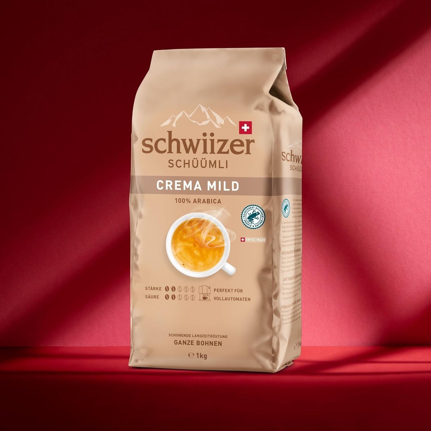 Schwiizer Schüümli Crema Mild, 100 % Premium Arabica-kaffebønner, frugtagtig og nøddeagtig, til fuldautomatiske kaffemaskiner, 2/5 styrke, let ristet, Rainforest Alliance-certificeret, 1 kg (pakke med 2)