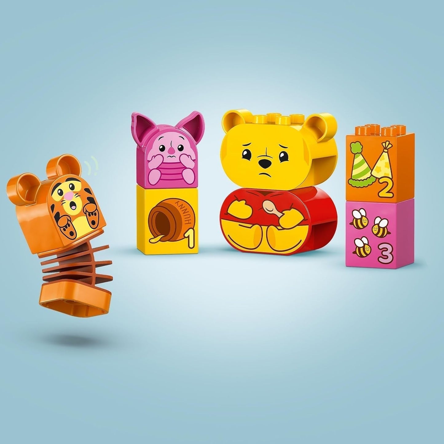 LEGO DUPLO - Disney Plys's fødselsdagsfest - pædagogisk legetøj til førskolebørn - sæt med 3 minifigurer inklusive Peter Plys, Tigger og Gris - gaveidé til drenge og piger fra 1,5 år 10457 Beuche byggesæt den LEGO-Store