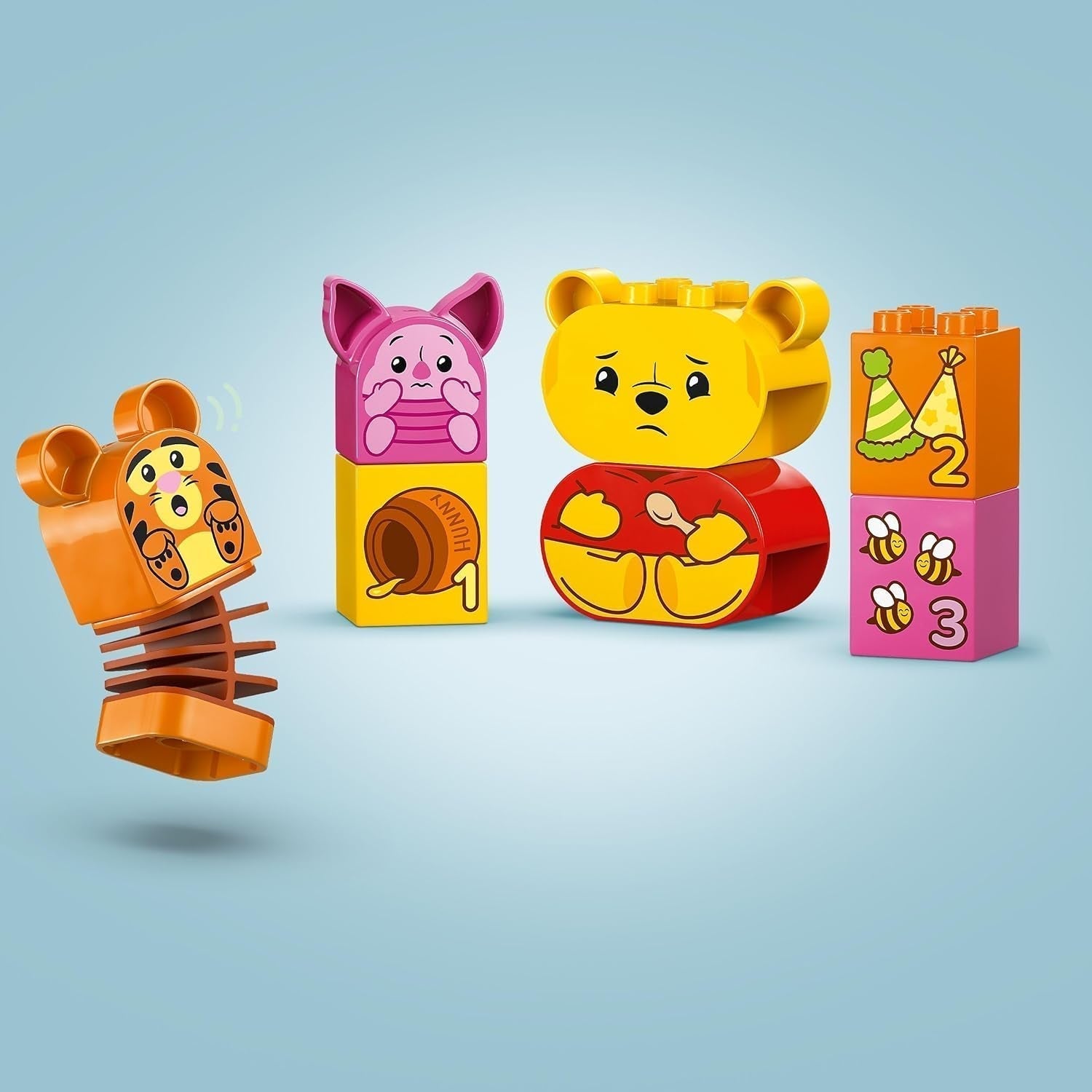 LEGO DUPLO - Disney Plys's fødselsdagsfest - pædagogisk legetøj til førskolebørn - sæt med 3 minifigurer inklusive Peter Plys, Tigger og Gris - gaveidé til drenge og piger fra 1,5 år 10457 Beuche byggesæt den LEGO-Store