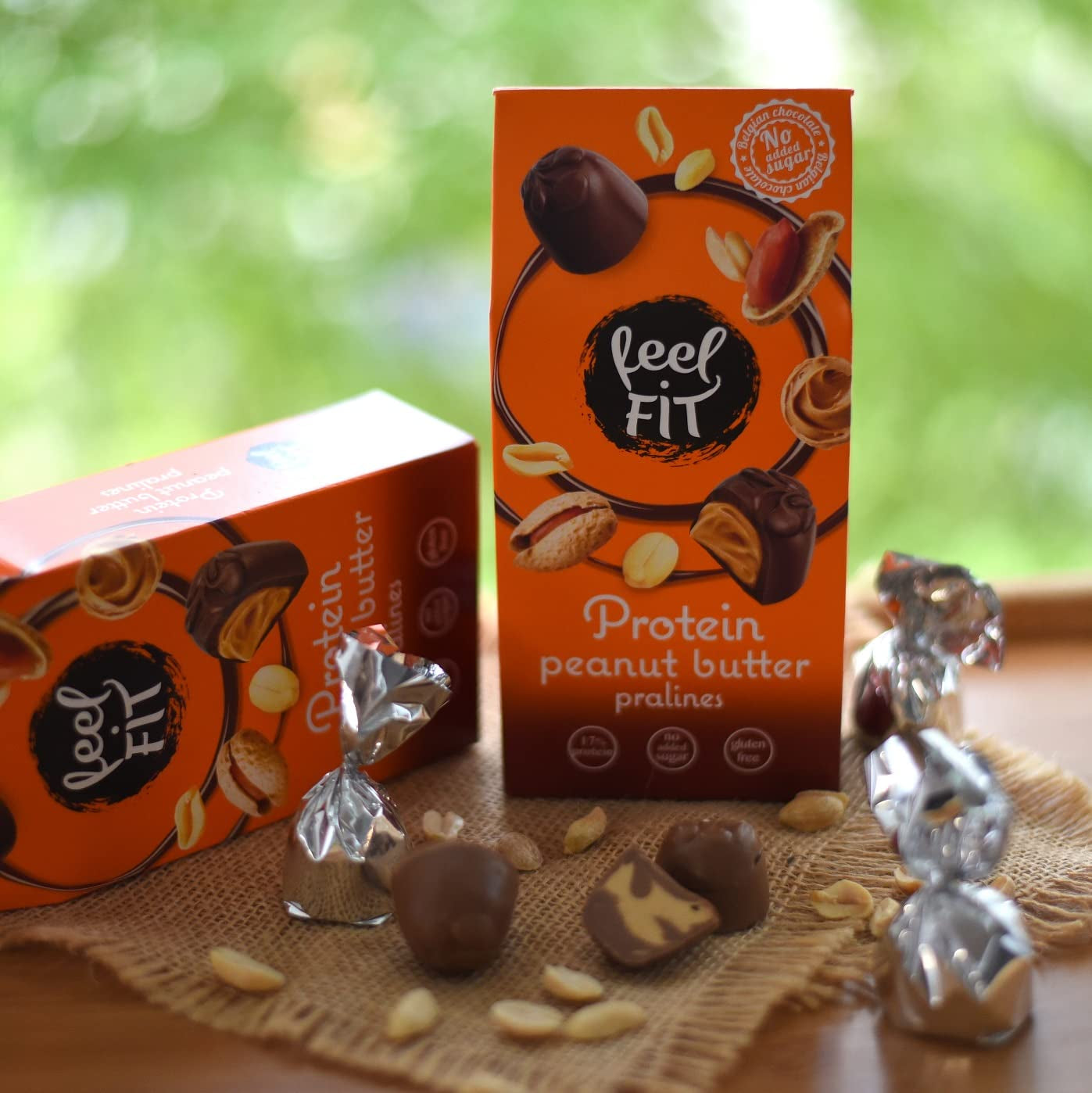 Feel FIT Jordnøddesmørproteinpraliner i højkvalitets mælkechokolade, uden tilsat sukker, 17 % protein, glutenfri 66 g (1 pakke)