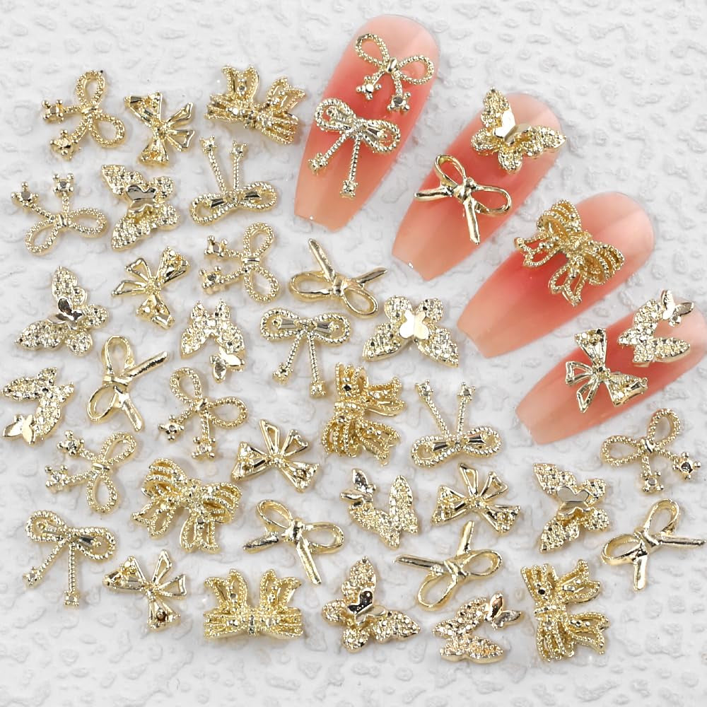 50Stück 3D Guld Sløjfe Nail Charms Butterfly Nail Art Charms Legierung Bogen Nagel Charms Nägel Zubehör Schleife Nagelschmuck Metall Schleifen Schmetterling Nageldesign Nagelanhänger Nailart Strasssteine