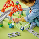 LEGO DUPLO Bybanebro og spor - Udvidelsessæt, Gave til børn fra 2 år, Bygge- og genopbygningssæt, Udviklingssæt til børnehaver, Pædagogisk legetøj 10426 Byggesæt Besuche den LEGO-Store