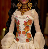 Barbie Signature Day of the Dead 2025 dukke-samlerfigur i cremefarvet kjole med flæser, morgenfruer og sløjfer, blomsterkrone i hår og Calavera-ansigtsmaling, JBJ05